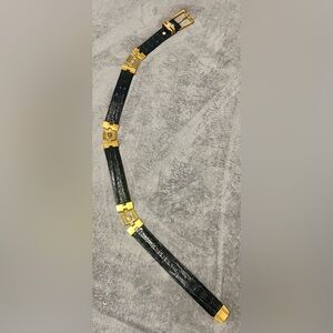 Black leather and gold statement belt